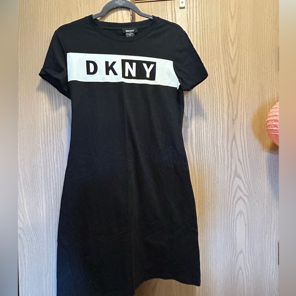 DKNY black short sleeve dress. Size small. Brand new with tags.